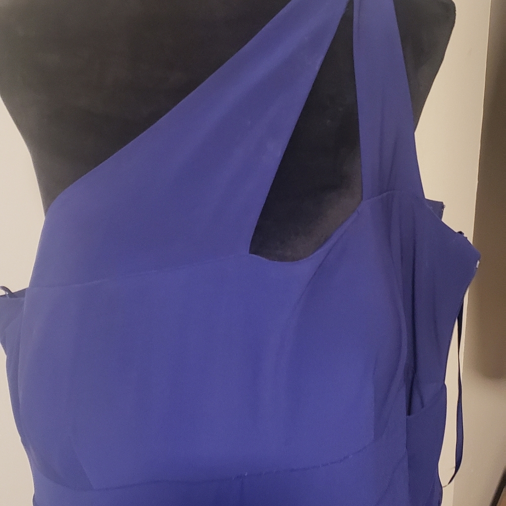 Purple ruffle dress. Form fitting